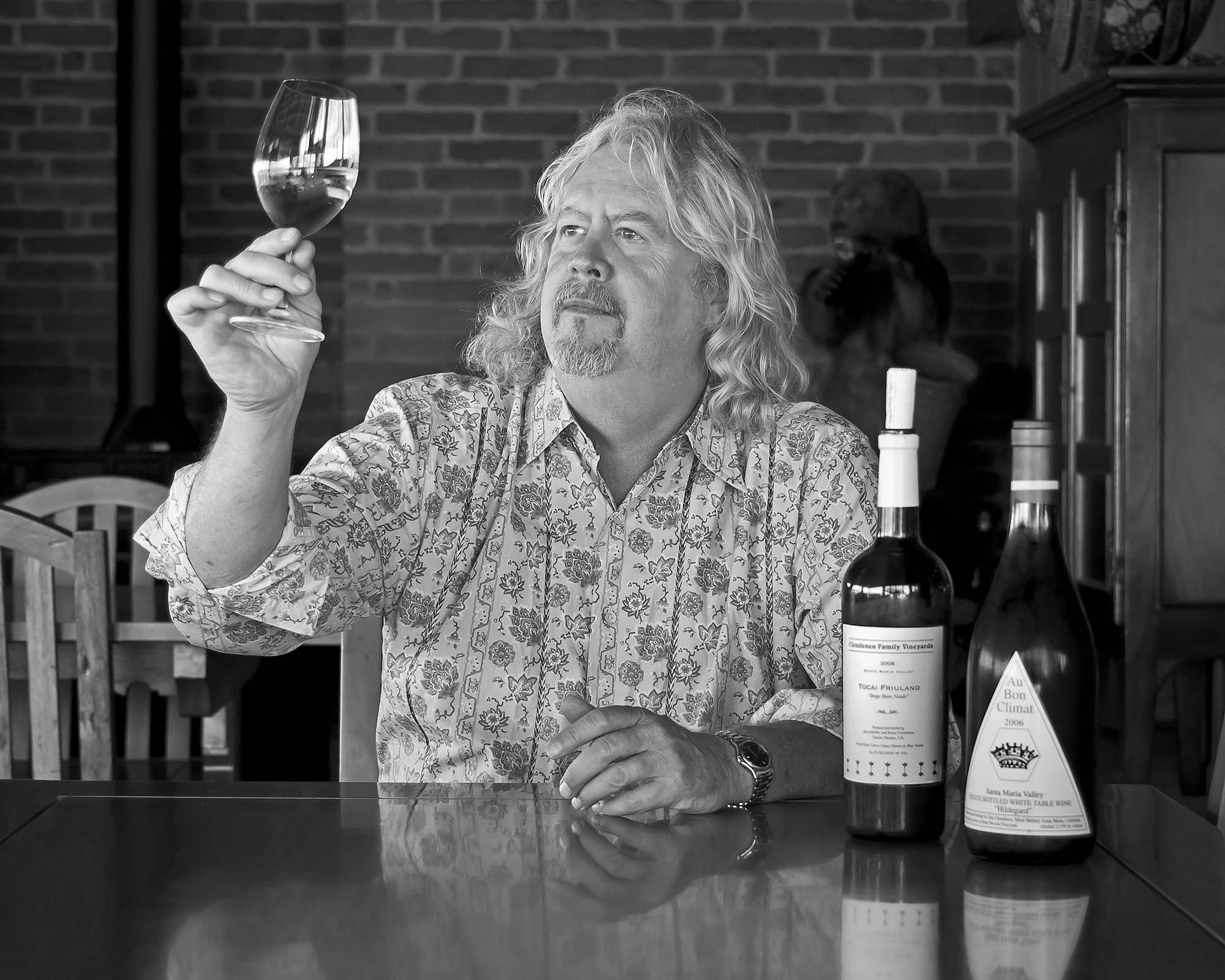 Jim Clendenen looking at a glass of Tocai Fruilano wine